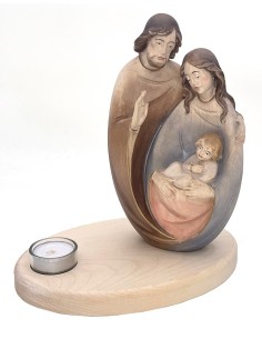 Hadcarved wooden Nativity with candle