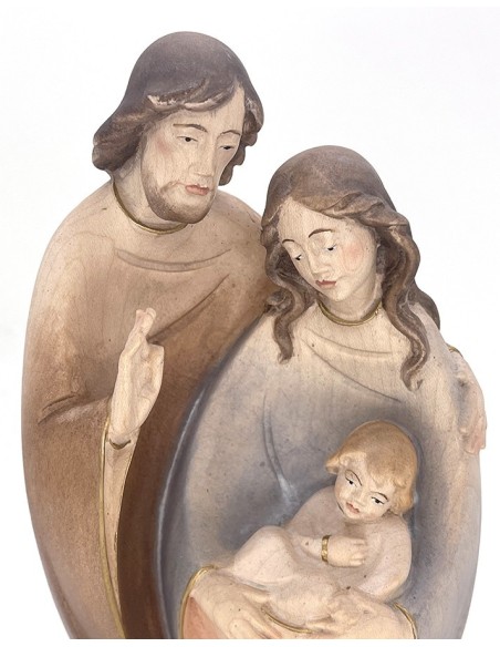 Hadcarved wooden Nativity with candle