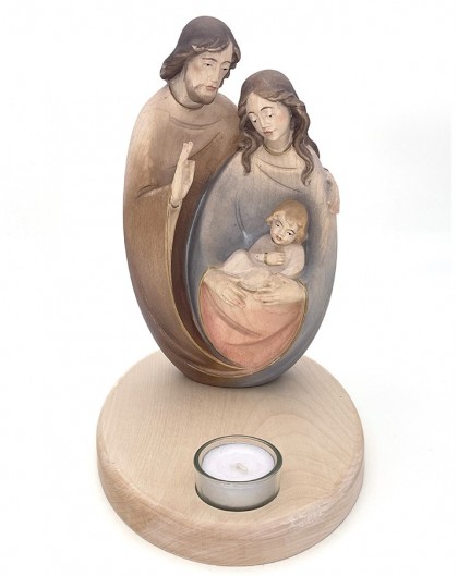 Hadcarved wooden Nativity with candle