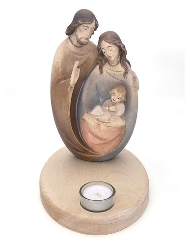 Hadcarved wooden Nativity with candle