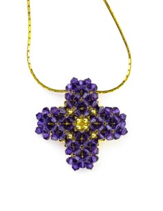 Swarovski Violet and gold Cross necklace Swarovski Violet and gold Cross necklace
